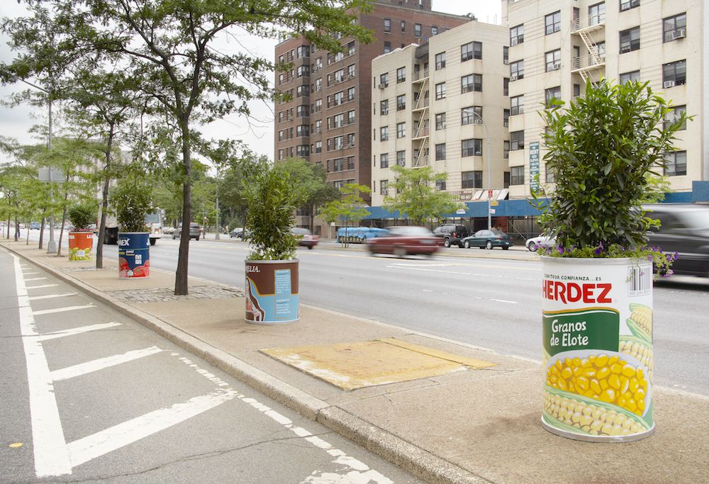 Alejandro Diaz, A Can for All Seasons, 2005, Grand Concourse, Bronx, Courtesy of the Public Art Fund, photo by Tom Powell Imaging. Inspired by the practice in rural households of growing plants in empty grocery-store cans, Diaz created four sculptural reproductions of brand-name canned goods, each representing a different type of food that is indigenous to Mexico: corn, chilies, chocolate, and tomatoes.<br/>